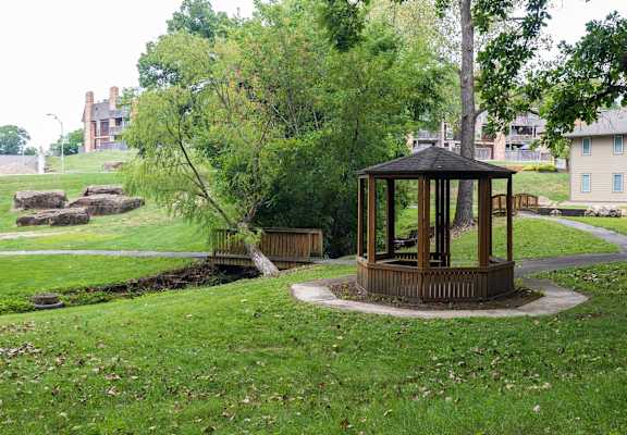 a gazebo in the middle of a park