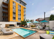 Thumbnail 1 of 27 - Pool with lounge seating