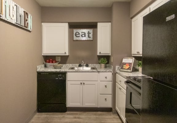 This is picture of the kitchen in the 823 square foot 2 bedroom apartment at Aspen Village Apartments in Cincinnati, OH.