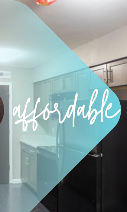 A room with a washer and dryer in it.