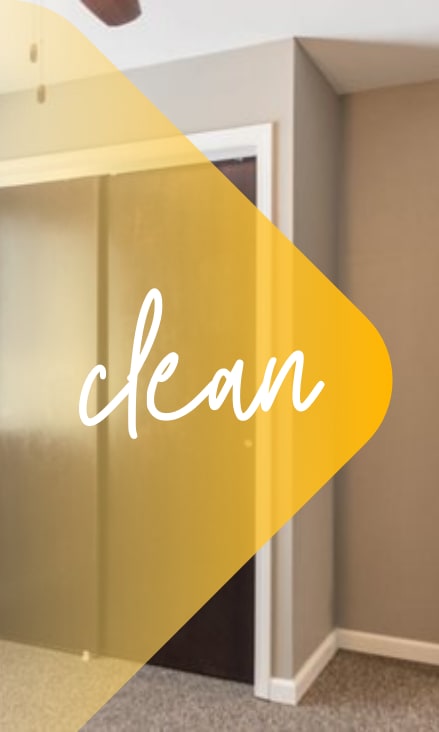 A clean laundry room and kitchen area.