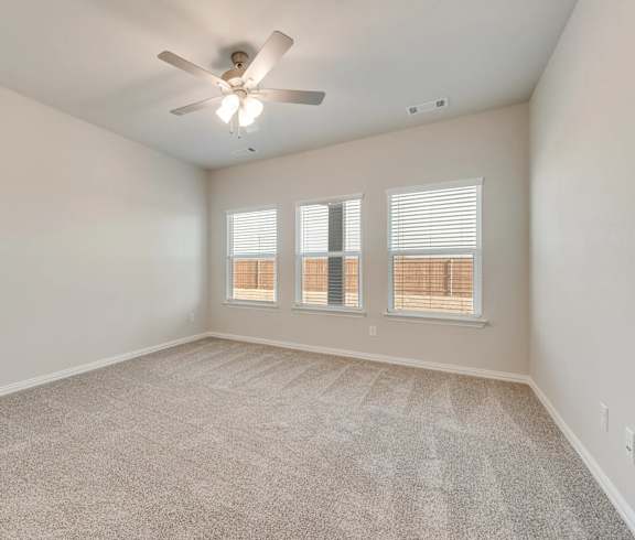 A Room With a Ceiling Fan at Cottages at Beltmill Apartments, Texas, 76131