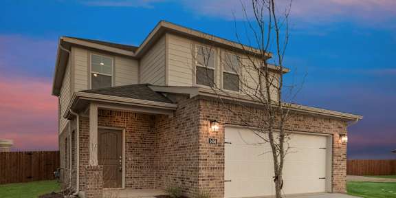 A House With a Brown Brick Exterior at Cottages at Beltmill Apartments, Saginaw, 76131