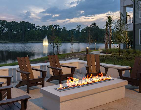 Drift Town Center East outdoor fire pit with lake and fountain views