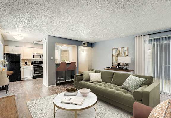 a living room with a couch and a table
