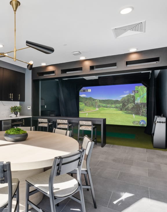 a dining room with a view of a golf course at Stonehill at West Orange, West Orange, New Jersey