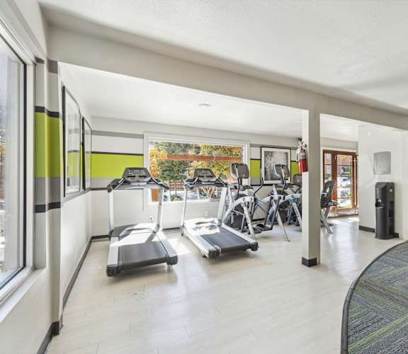 the gym at the district flats apartments in lenexa
