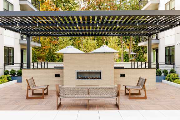 Outdoor patio with fireplace at The Lawrence, Parsippany, New Jersey