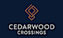 The image is a logo for Cedarwood Crossings.
