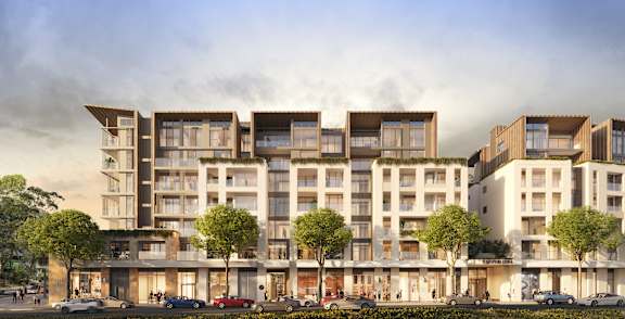 A modern apartment complex with multiple floors and balconies.