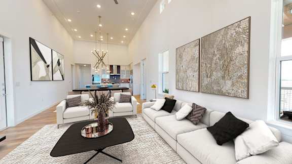 a living room with couches and a table