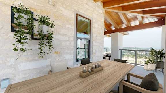a dining room with a wooden table and a large window