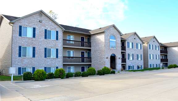 Cantwell crossing three story apartment buildings with exterior entry