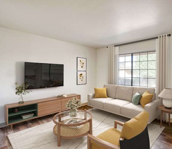 a living room with a couch and a tv