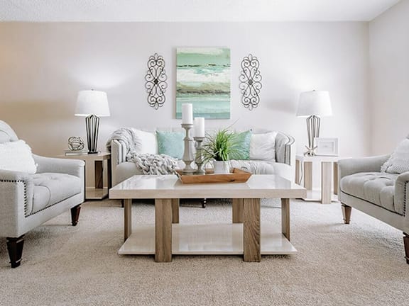 a living room with a couch and a table