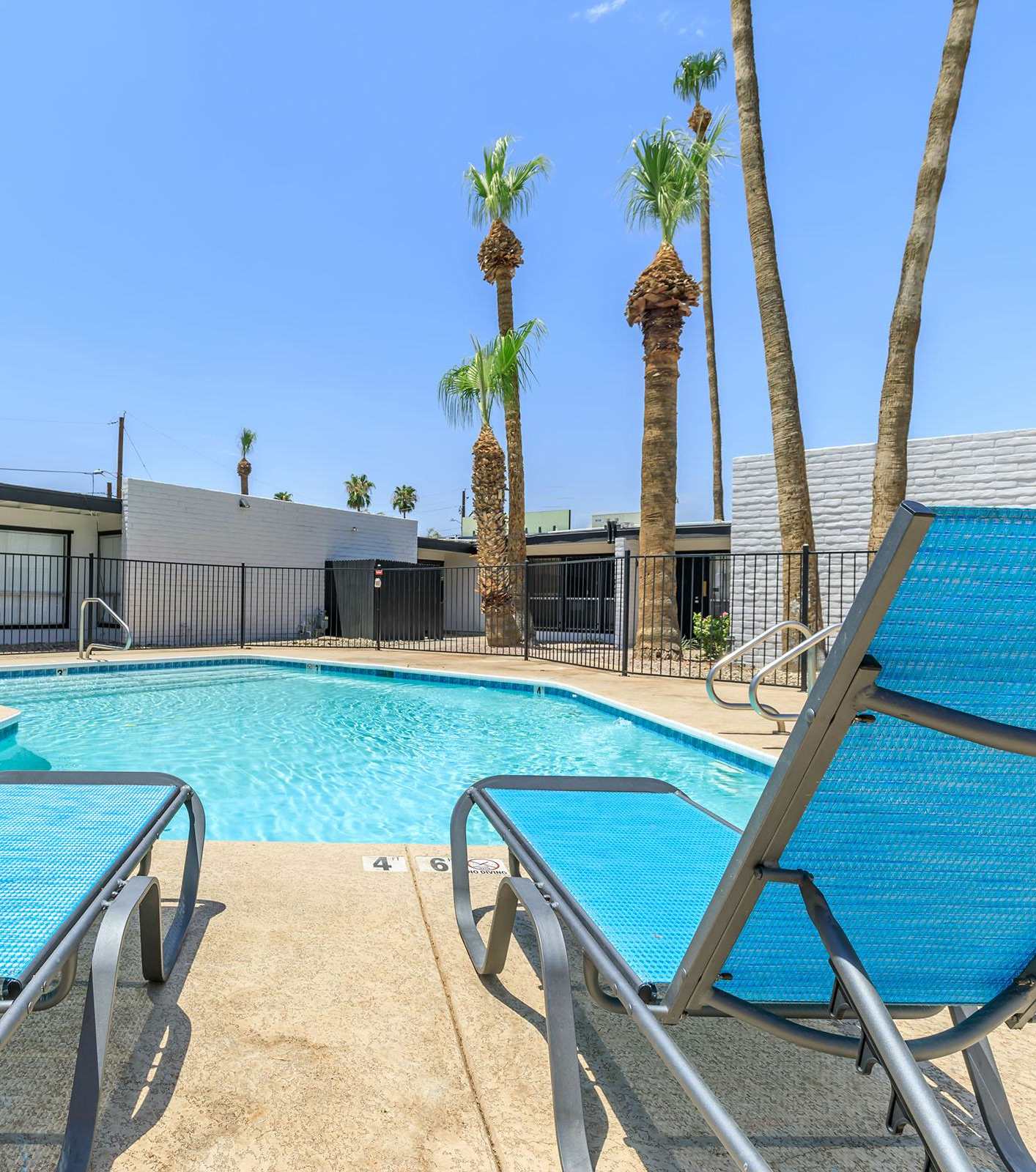 Pool and poolside area at The Cara Apartments.