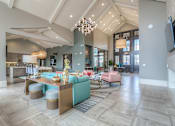 Thumbnail 19 of 53 - Apartments for Rent in Lenexa-Waterside Residences at Quivira Apartments Kitchen With Hardwood Flooring And Dark Wooden Cabinetry And Stainless Appliances  at Waterside Residences on Quivira, Lenexa,