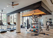 Thumbnail 26 of 31 - Contemporary fitness center at The Baldwin at St. Paul Square, San Antonio