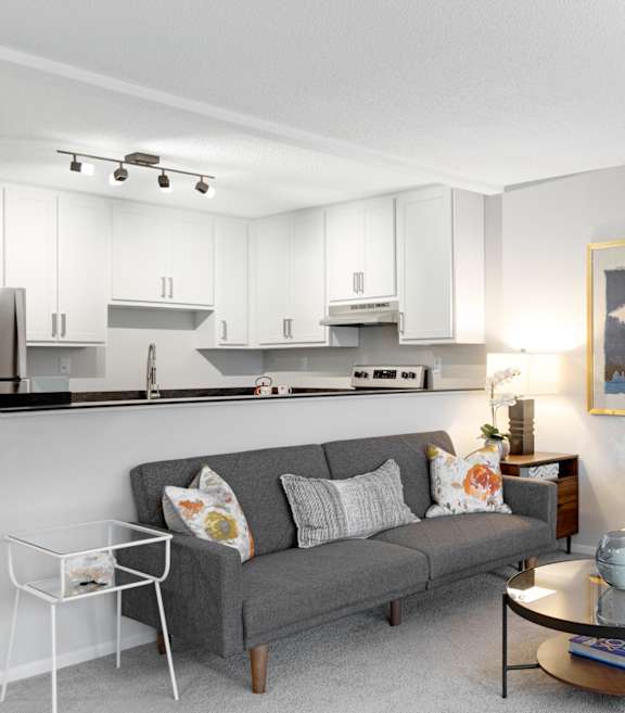 Furnished model unit's living room in an apartment home at Tylia