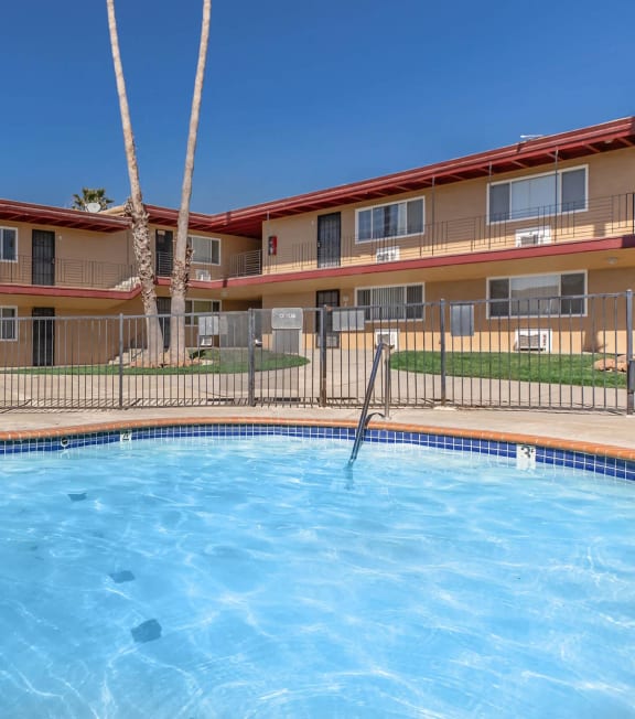 a large swimming pool in front of a building at Oakridge Apartments, Antioch, 94509