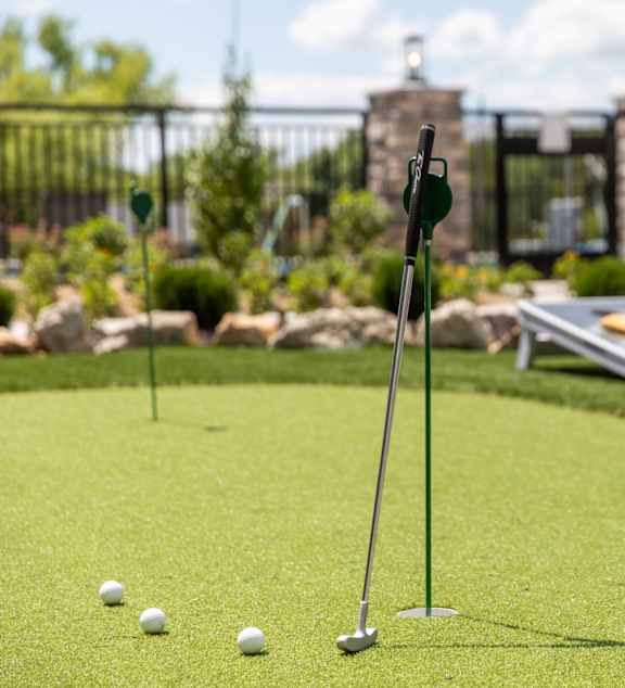 a set of golf clubs on a golf course