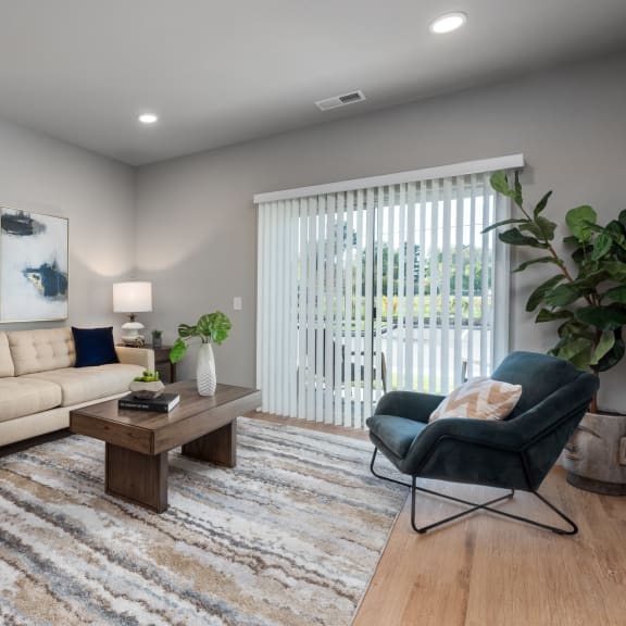 a living room with a couch and a chair