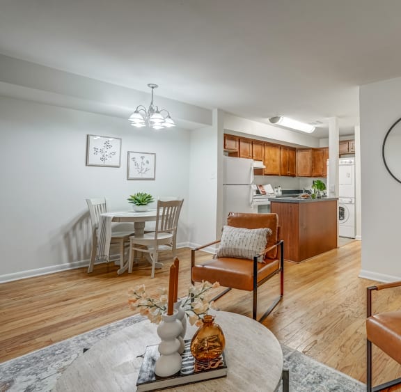 an open living room with a dining room and a kitchen