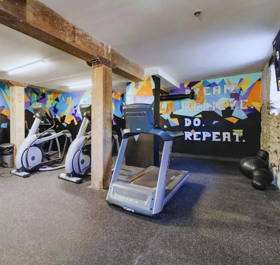 the gym at the flats at big tex apartments