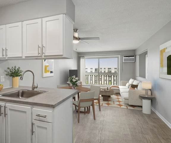 Kitchen with cabinets and sink at Cedarvale Highlands Apartments, Eagan, MN 55122