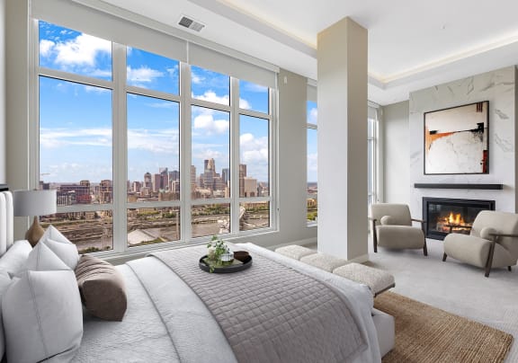 a bedroom with a bed and a view of a city at Expo, Minneapolis Minnesota