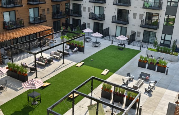 a view of the courtyard of an apartment building from above