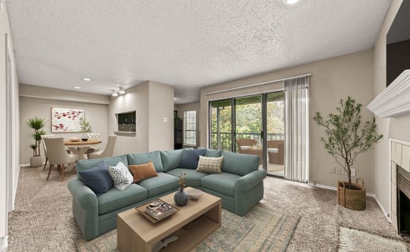 a living room with a blue couch and a coffee table