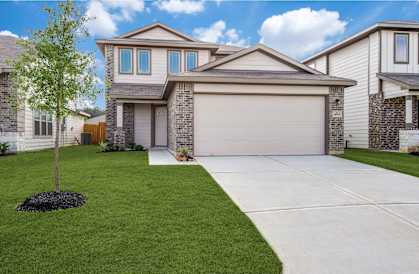 a house with a driveway in front of it