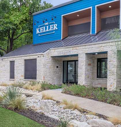 A blue and white building with the word Keller on it.at The Keller, Texas