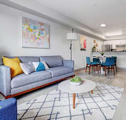a living room with a couch and a table