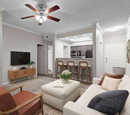 a living room with a ceiling fan