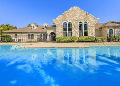a large pool in front of a house