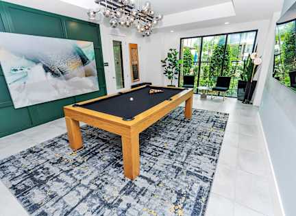 Pool Table at POINTE AT EAST SHORE APARTMENTS, APOPKA, FL, 32703