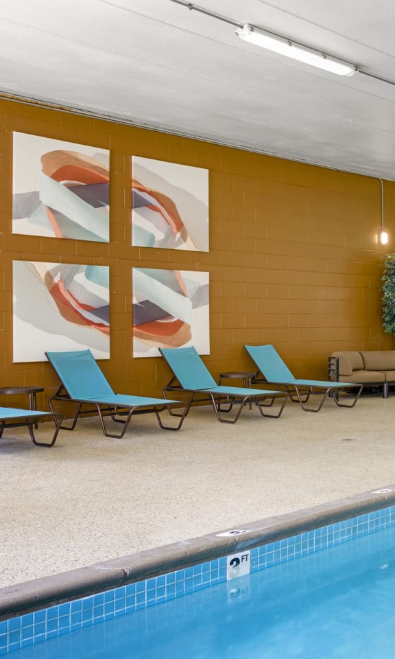 a swimming pool with chairs and a water feature at Hamline Terrace, Roseville, MN, 55113