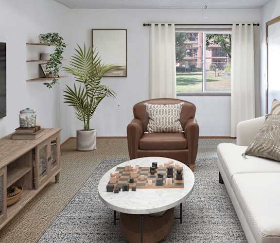 a living room with a couch chair and coffee table with a chess board on top of it
