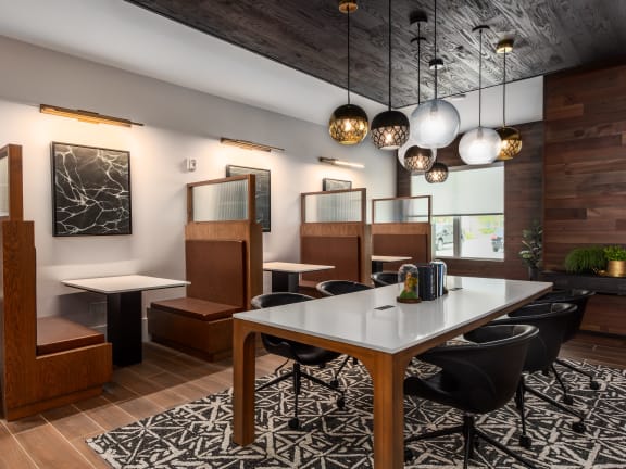 Resident lounge with individual booths  at Chapter at the Streets of St Charles, Saint Charles, Missouri