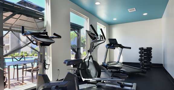 Gym with Cardio Machines at Normandy Woods in Riviera East, Houston, TX, 77015