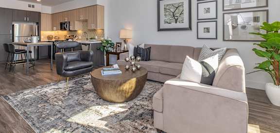 a living room with a couch and a table