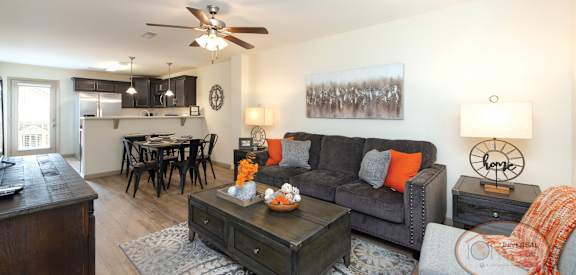 a living room with a couch and a table