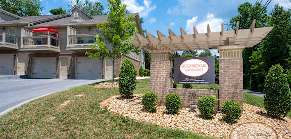 A sign for Rockingham is displayed in front of a building.