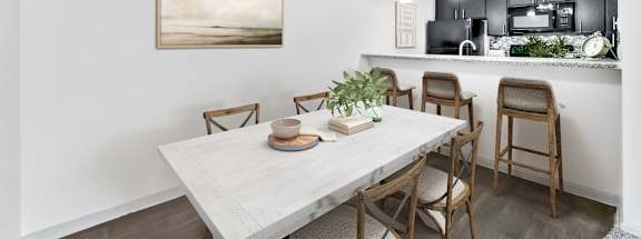our executive dining room and kitchen with a white table and chairs at Vesper, Texas, 75254