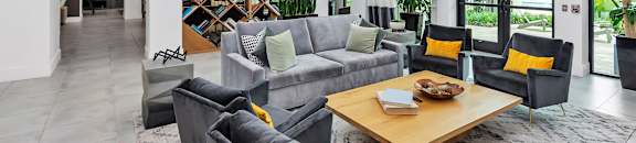 Clubhouse living area at POINTE AT EAST SHORE APARTMENTS, APOPKA, 32703