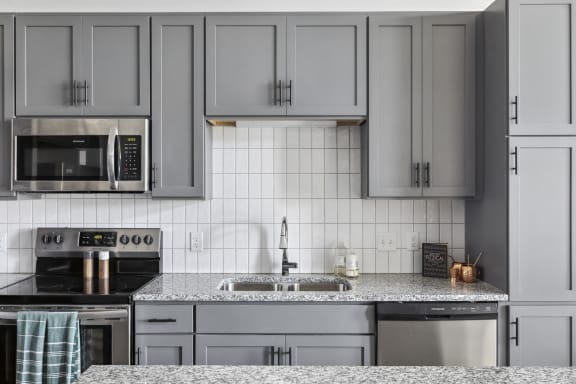 savor apartments kitchen details with stainless steel appliances