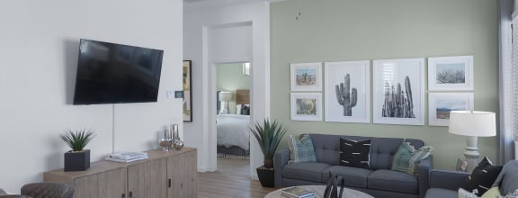 a living room with a couch and a tv