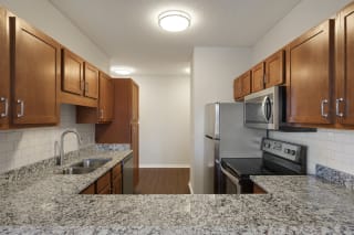 Kitchen With Energy Efficient Appliances Kitchen With Energy Efficient Appliances at Waterstone Place, Minnetonka, 55305